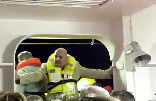 Sandor Feher helping evacuees amid the chaos